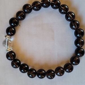 8mm Smoky Quartz with 1 8mm clear crystal bead bracelet size 6 to 7"